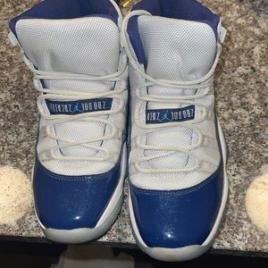 Jordan’s 11s white and Blue